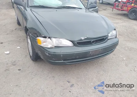 2000 Toyota Corolla Ce z USA, uszkodzony, nr VIN 2T1BR12E9YC340343